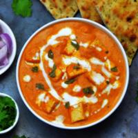 Paneer Makhni · Cottage cheese morseles, peppers, onion, tomatoes, curry and spices.