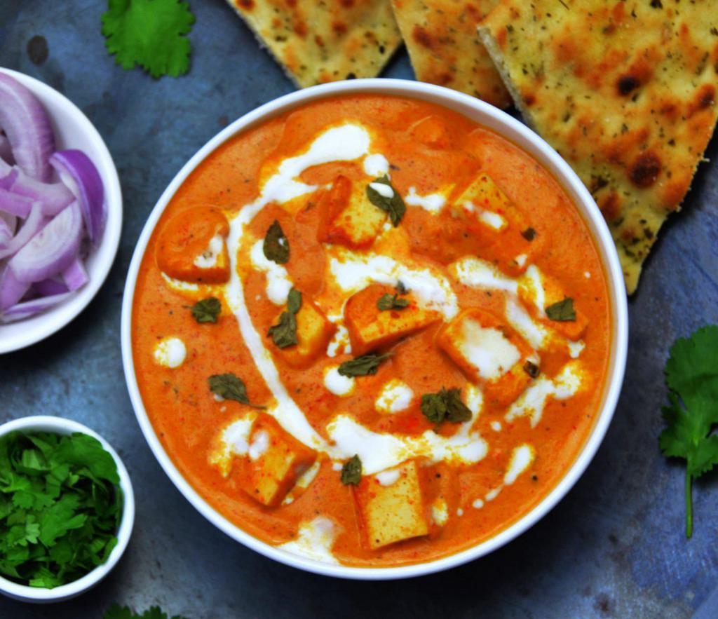 Paneer Makhni · Cottage cheese morseles, peppers, onion, tomatoes, curry and spices.