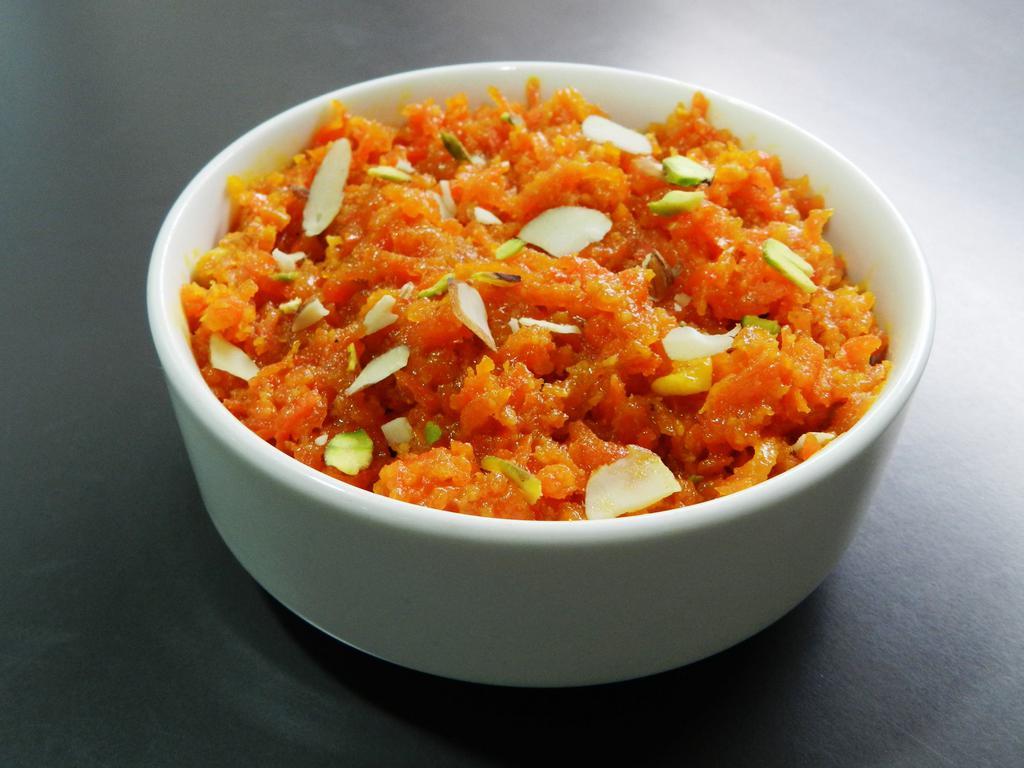Gajjar Halwa · Vegan. Warm carrot pudding with raisins.