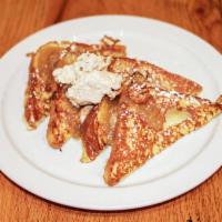 Pear French Toast · Brioche French toast with spiced pear sauce, pecans, cinnamon butter and syrup. Veggie.