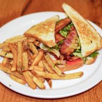 BLT Sandwich · Bacon, fresh tomato, balsamic mayo and lettuce on griddle fried sourdough; served with frenc...