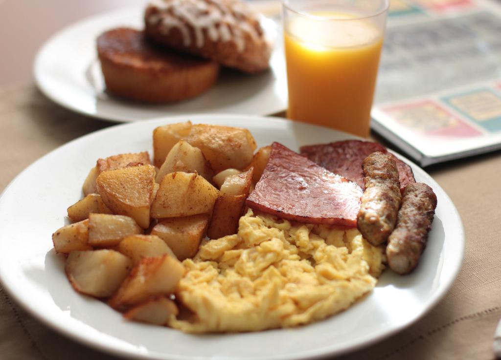 Country Breakfast · 2 eggs, home fries , ham and sausage and a grilled English muffin.