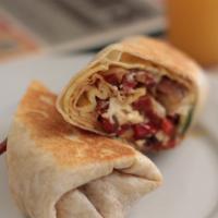 Breakfast Wrap · Scrambled eggs, cheese, choice of ham, sausage, bacon or linguica.