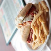 Chicken Parmesan Sandwich · Italian breaded chicken breast, marinara sauce and provolone cheese. Served with french fries.