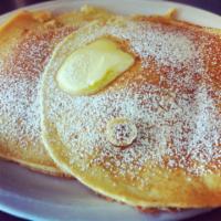 Buttermilk Pancake Breakfast · 3 piece of light and fluffy buttermilk pancakes. Hot off the grille and served with butter m...