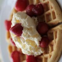 Belgian Waffle Breakfast · Hot Belgian waffle with strawberries, homemade whipped cream and powdered sugar. Hot off the...