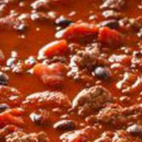 The Classic Chili · A traditional slow cooked homemade chili with ground beef, beans and veggies, topped with sh...