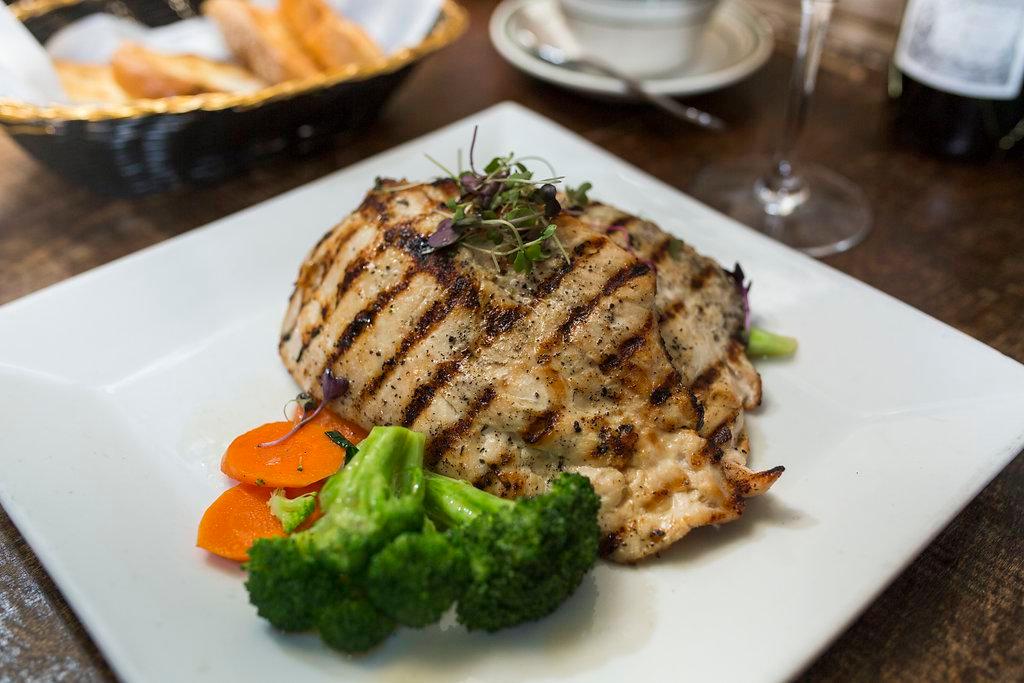 Pechuga a La Plancha · Grilled chicken breast. Add mushroom or garlic sauce for an additional charge.