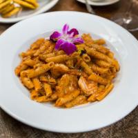 Penne a la Vodka · Penne in a creamy vodka sauce. Contains bacon. Add chicken or shrimp for additional charge.