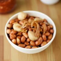Beijing Style Vinegar Peanuts · Candied kombu and sweet garlic. Vegan.