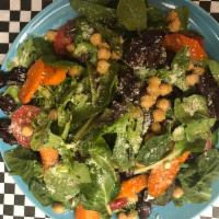 Mix Green Salad · Mixed green salad, baby spinach, tomato, olives and squash with lemon vinaigrette.