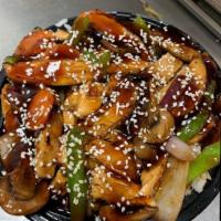 Bourbon Bowl · Grilled steak or chicken with wok-seared carrots, red onions, mushrooms, and green bell pepp...