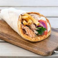 Twisted Chicken Souvlaki · Char-grilled yoghurt marinated chicken breast skewer served with tomato, onion, mustard-mayo...