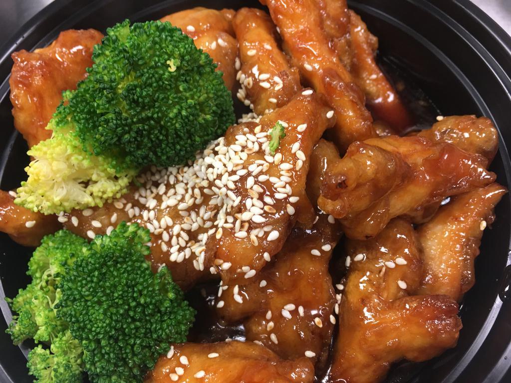 Dinner Sesame · Your choice of ingredient is lightly breaded and deep fried. Stir fried in a tangy sweet brown sauce, side of steamed broccoli topped with toasted sesame seeds. 