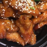 Kid's Sesame · Crispy chicken in a honey soy glaze. Served with steamed rice.