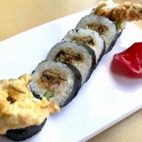 Spider Roll · 6 pieces. In - deep fried soft shell crab, crab meat, cucumber, kaiware, gobo. Out - eel sau...