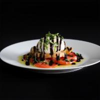 Burratta Caprese Salad · house-made crouton // basil // balsamic reduction // vine ripe tomato // burrata //cracked b...