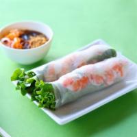7B. Fresh Spring Rolls with Shrimp · 2 rolls. Wrapped with noodles, lettuce, mint, chives, and bean sprouts.