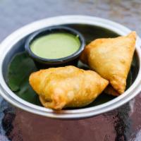 Samosa 2 Pcs ·  Deep fried pastry with a savoury filling of spiced potatoes