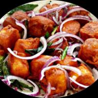 Madurai Paneer 65 · Fried cottage cheese cubes and marinated in spices. Vegan.