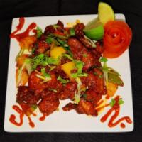 Andra chilli chicken  · Boneless chicken marinated,fried &tossed with chili sauce
