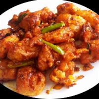 Madurai fish 65 · Boneless fish marinated with ground spices & deep fried.