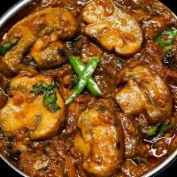  Mushroon Curry · mushroom sauteed with onions, black pepper and spices, cooked Madurai style. Choice of side....