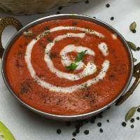Butter Chicken Masala · Tandoori brown chicken meat cooked in rich creamy tomato sauce with herbs and spices. Choice...