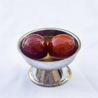 Gulab Jamun · Milk-solid-based sweet, ball shaped dipped in sugar syrup