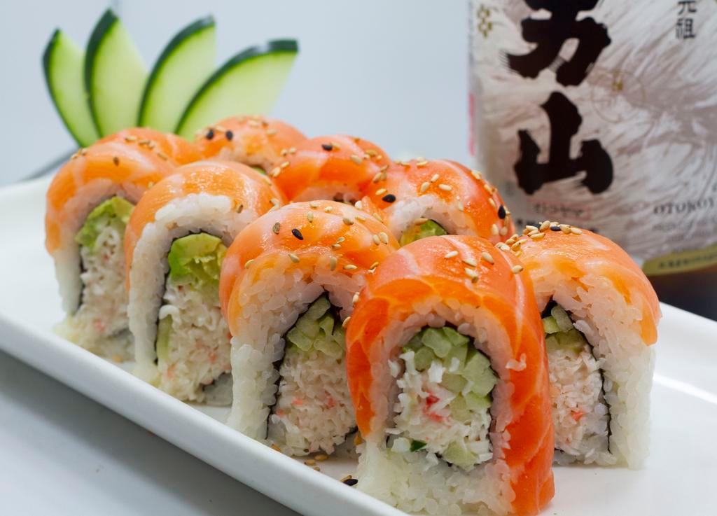 Chameleon Roll · Crab, cucumber, avocado, with choice of albacore, tuna or salmon on top.