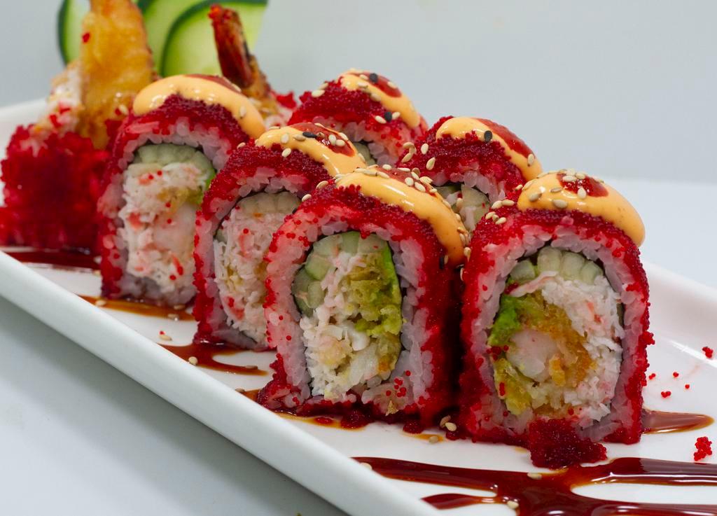 Crazy Masago Roll · Fish eggs. 2 shrimp tempura, cucumber, avocado and crab inside with spicy fish eggs, spicy mayo and eel sauce on top.