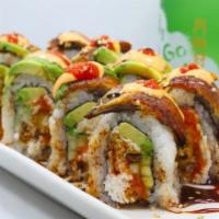 Godzilla Roll · Cucumber, avocado, soft shell crab, crab mix and, spicy tuna inside with eel, eel sauce and ...