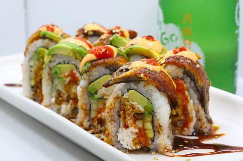 Godzilla Roll · Cucumber, avocado, soft shell crab, crab mix and, spicy tuna inside with eel, eel sauce and spicy mayo on top.