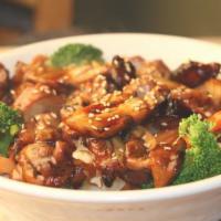 Teriyaki Chicken Bowl · Served with steamed vegetables on top of rice with teriyaki sauce.