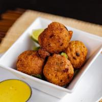 Atlantic Cod Fish Fritters · Lime and Curry Dipping sauce