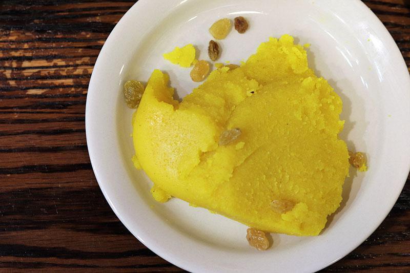 Sooji Halwa · Semolina cooked with sugar and flavored with cinnamon and butter.