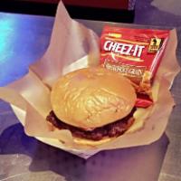 Kids Hamburger · Patty and bread. Served with cheez a drink and bomb pop.