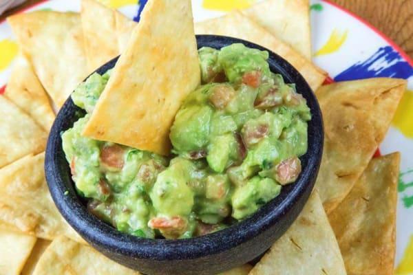 Guacamole Regional · Chunky, fresh avocados cut in pieces and topped with pico de gallo. Served with golden flour tortilla chips.