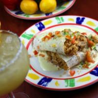 California Burrito · Grilled chicken or steak with Mexican rice and refried beans wrapped in a 12