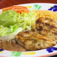 Pollo a la Parilla · 8 oz. grilled chicken breast. Served with Mexican rice, refried beans and guacamole salad.
