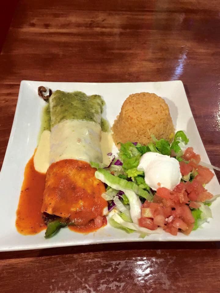 Burrito Especial · 1 large flour tortilla filled with chicken, chorizo, onions & beans. Served with lettuce & sour cream on the side.