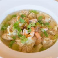 Wonton Soup with Prawns · Marinated minced pork, prawns and scallions in wonton skin, served with prawns and lettuce i...