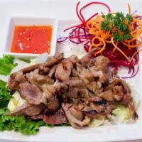 Honey Pork · Grilled marinated pork with honey glaze, served with sweet and sour sauce.