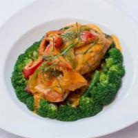 Choo Chee Salmon · Grilled salmon, broccoli and green beans dressed with thick red curry sauce and kaffir lime ...