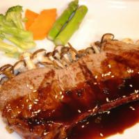 Beef Teriyaki with Rice · Broiled to perfection, then smothered in our own special teriyaki sauce. Served with broccol...