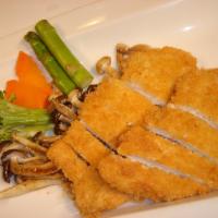 Chicken Katsu with Rice · Dipped in a light bread crumb batter, then deep-fried to perfection.