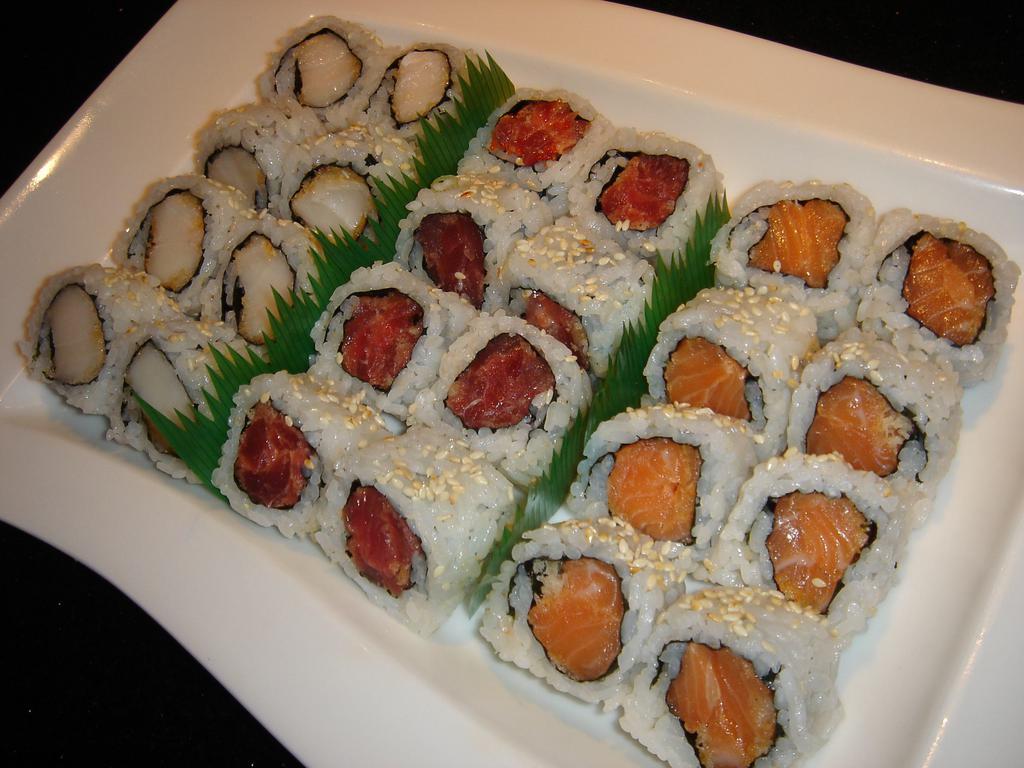  Triple Roll  · Raw. 24 pieces. Tuna roll, salmon roll, and yellowtail roll.