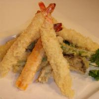 Shrimp Tempura · Lightly battered and deep-fried with tempura sauce and steamed rice.