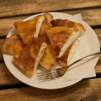 Cheese Flat Bread (Pide) · Mozzarella, feta, Parmesan cheese. Hand tossed dough.