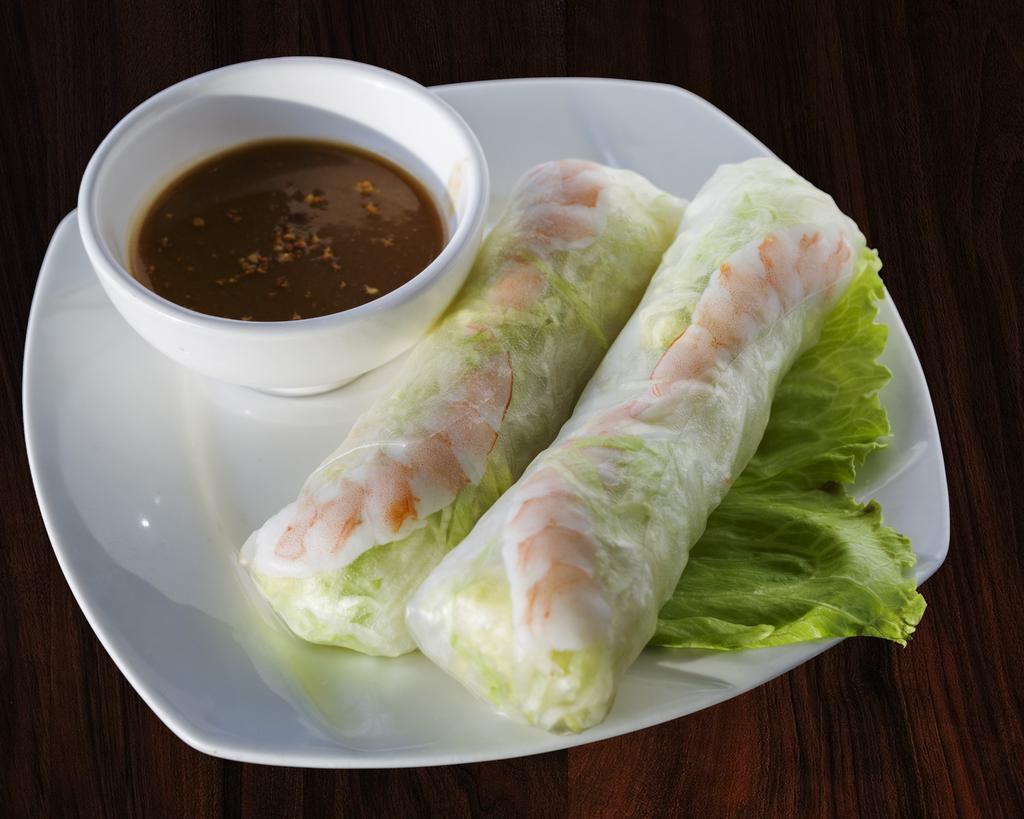 1. Fresh Spring Rolls · Fresh spring rolls wrapped in soft rice paper with lettuce and vermicelli. Served with peanut sauce.